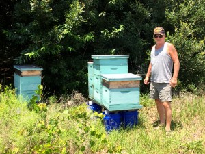 Rick with his beehives